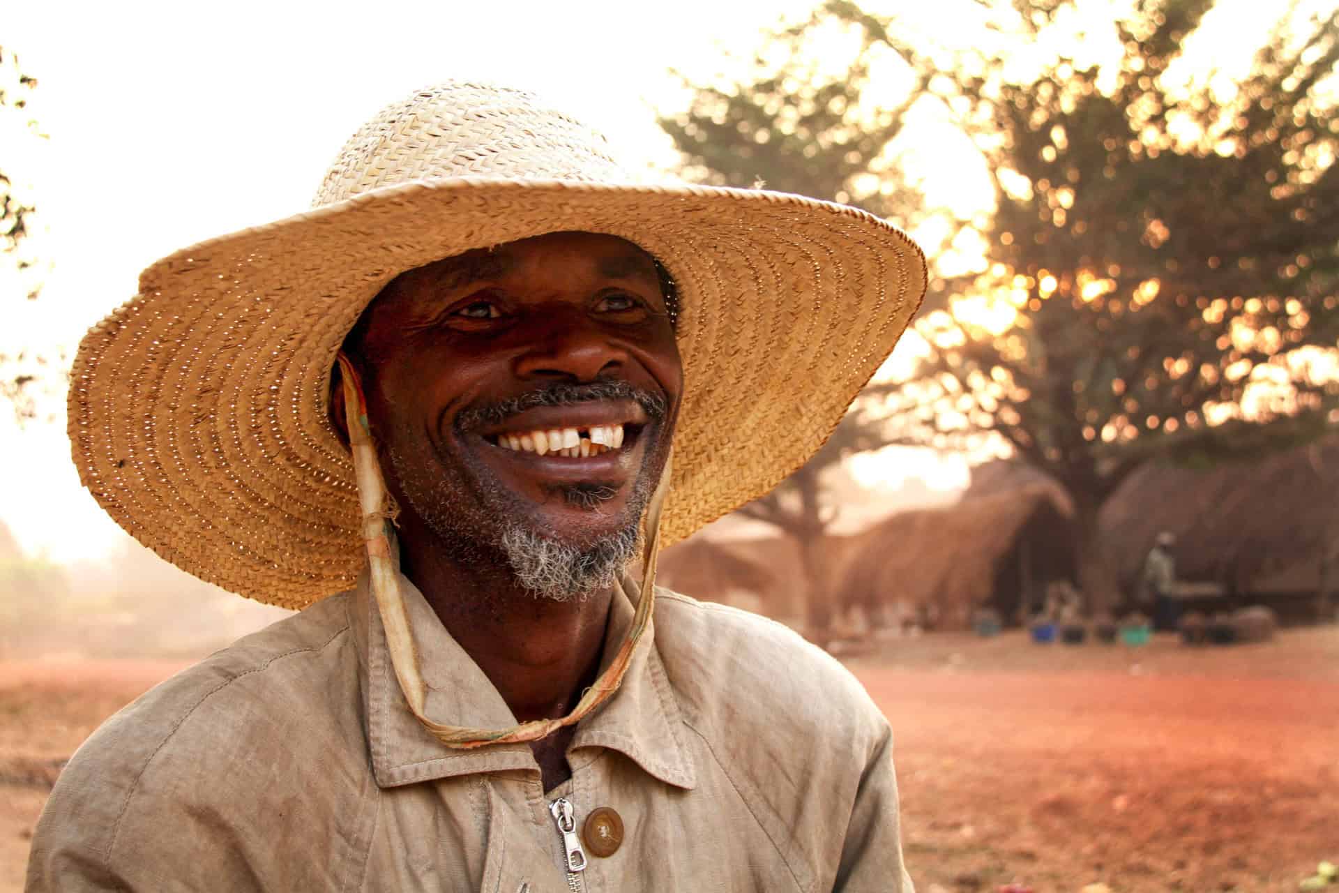 A man smiles for a photograph