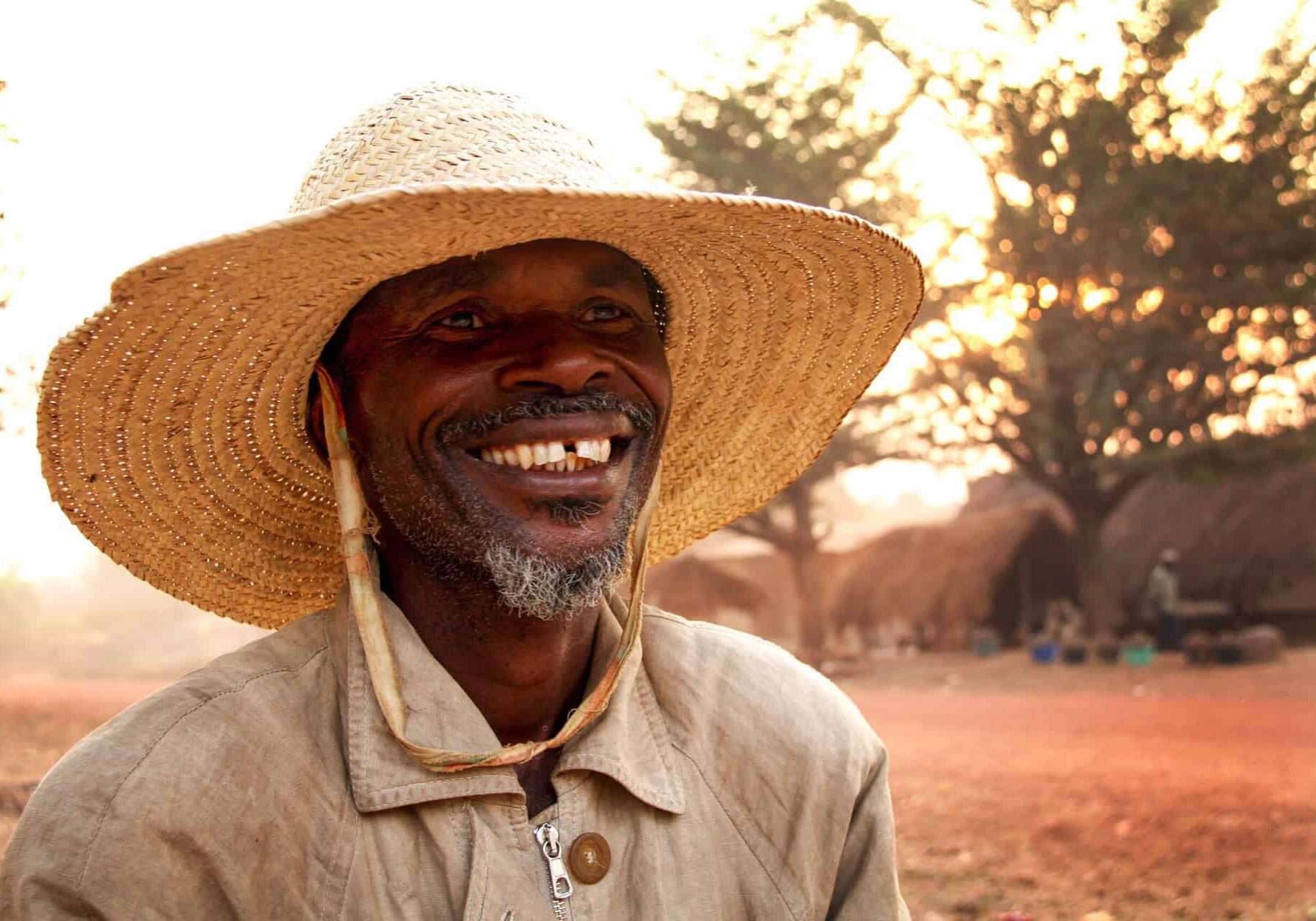 A man smiles for a photograph